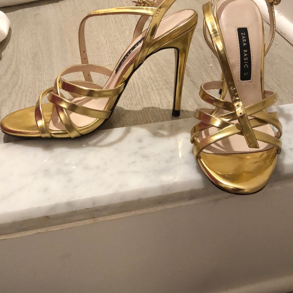 Gold strap heel